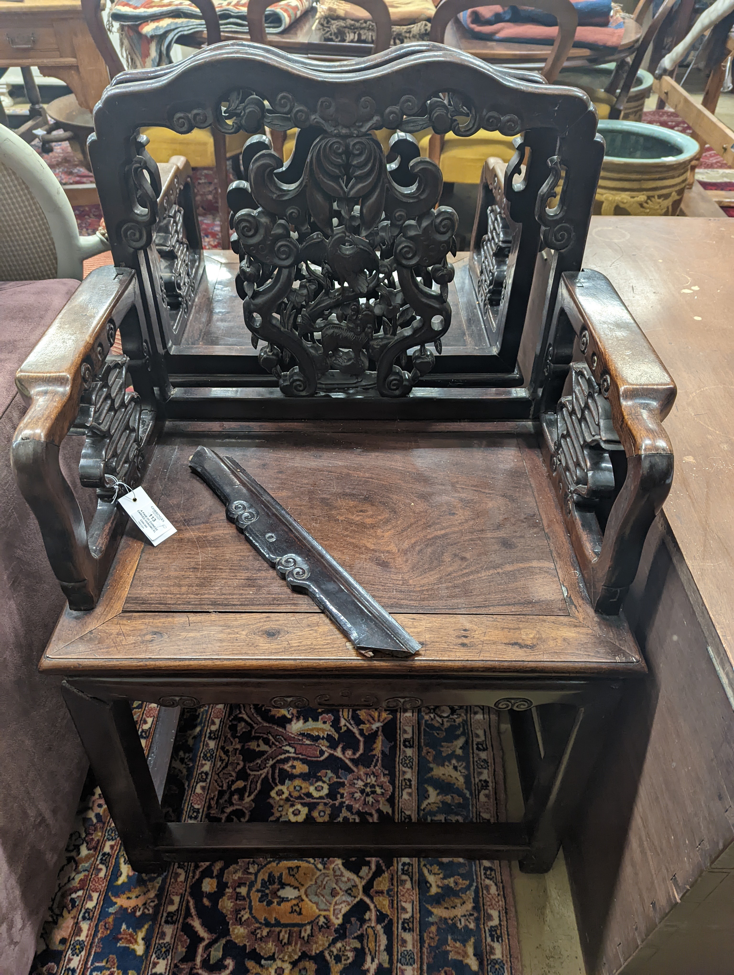 A pair of Chinese carved hongmu elbow chairs (a.f.), width 65cm, depth 48cm, height 96cm